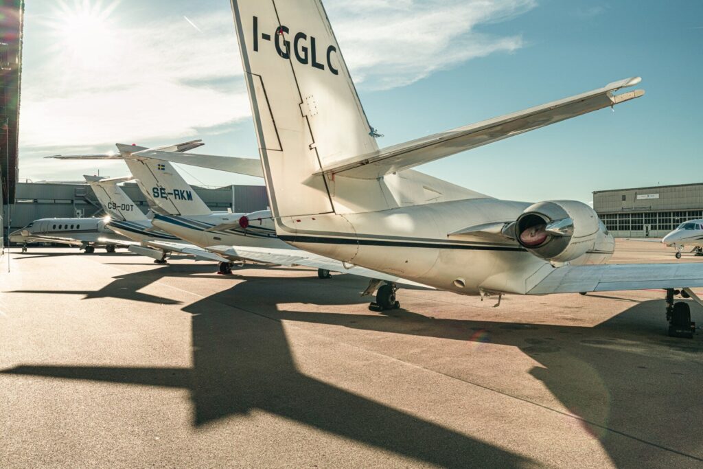 Modern Zürich private jet FBO terminal building with aircraft parking
