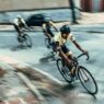 Tour de France cyclists racing through the French countryside at high speed