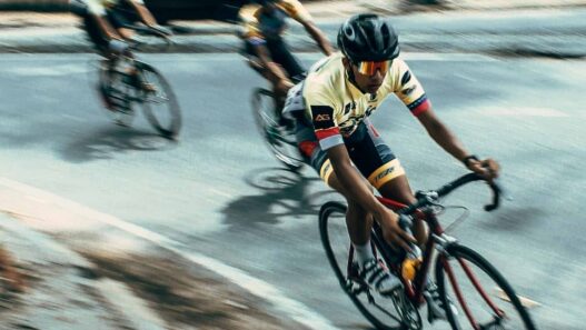 Tour de France cyclists racing through the French countryside at high speed