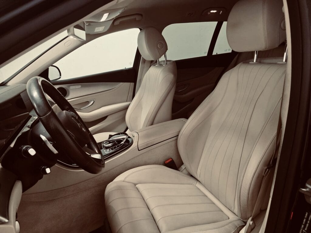 AI-powered chauffeur booking interface Zurich cryptocurrency USDC Bitcoin payment multi-modal private jet integration