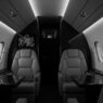 AI concierge private jets featuring precision technology interface in ultra-luxury cabin environment