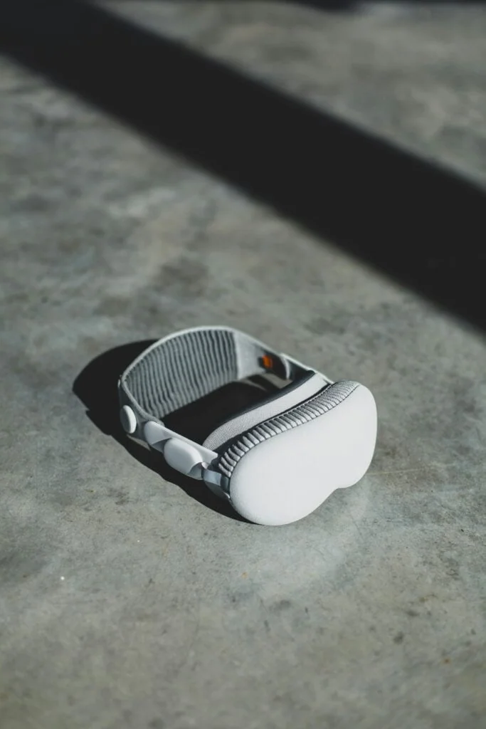 Apple Vision Pro Complete Review: Ultimate 2025 Guide - Is It Worth $3,500? 22 Apple Vision Pro Preview components laid out aesthetically on marble surface with luxury accessories fashion magazine photography style