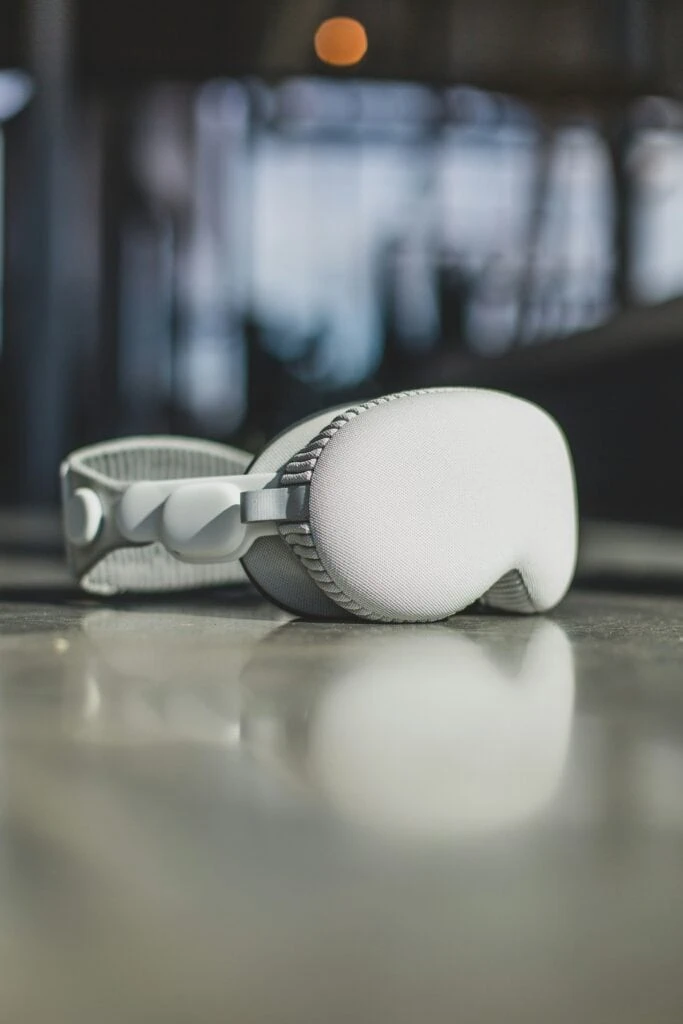 Apple Vision Pro Complete Review: Ultimate 2025 Guide - Is It Worth $3,500? 21 Person wearing Apple Vision Pro working productively with virtual screens floating around modern home office fashion magazine aesthetic