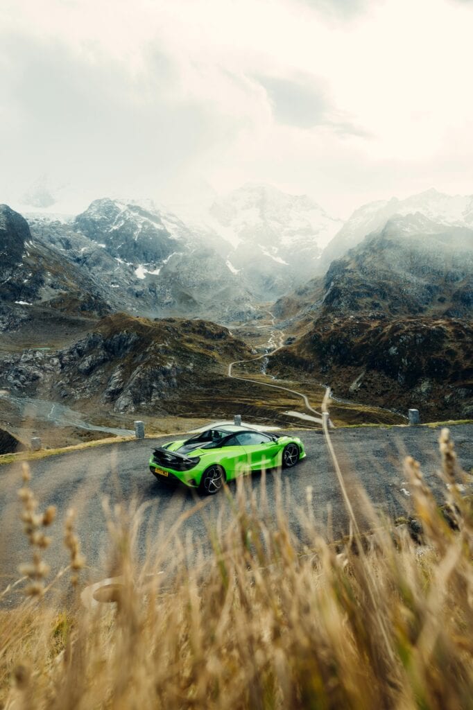 Zurich to St. Moritz luxury car transfer showing mc claren sedan on Alpine route
