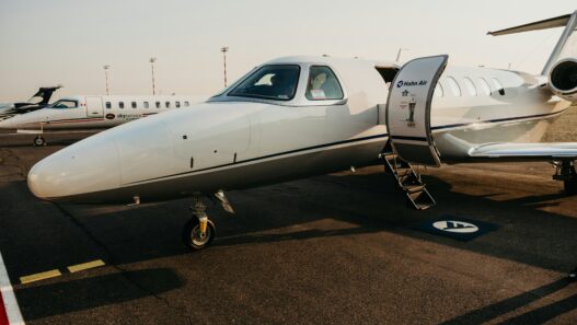 Zurich airport private jet transfer Mercedes S-Class FBO cryptocurrency payment executive ground transport