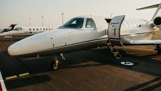 Zurich airport private jet transfer Mercedes S-Class FBO cryptocurrency payment executive ground transport