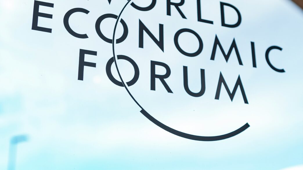 World Economic Forum Davos 2026 Congress Centre with helicopter landing VIP transport Switzerland