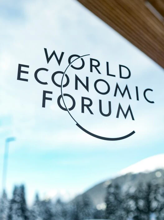 World Economic Forum Davos 2026 Congress Centre with helicopter landing VIP transport Switzerland