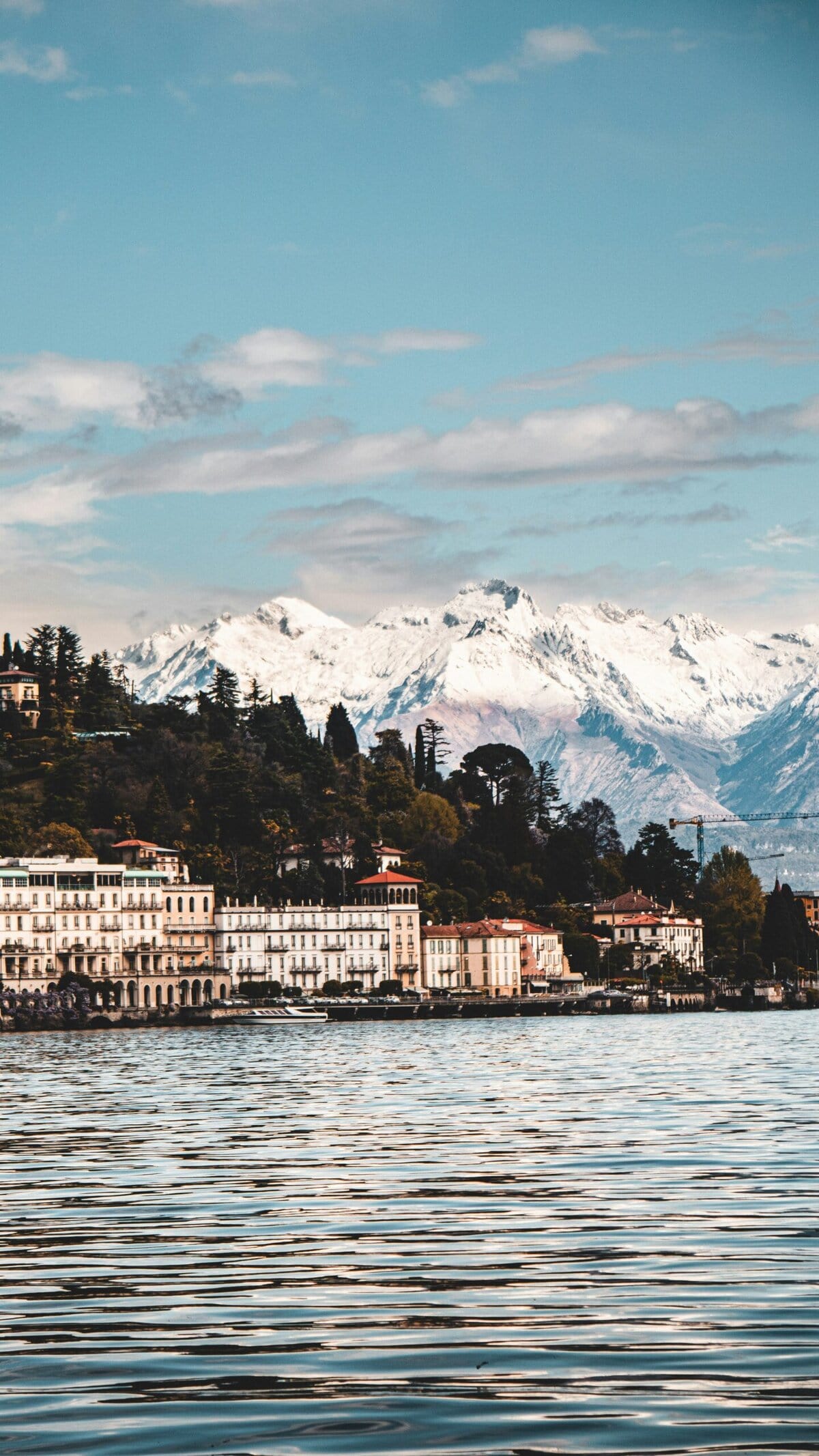 Lake Como Italy Varenna lakefront village colorful houses boats Italian Alps mountains
