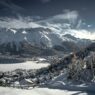St Moritz Switzerland winter ski resort with frozen lake mountains luxury hotels Engadin valley