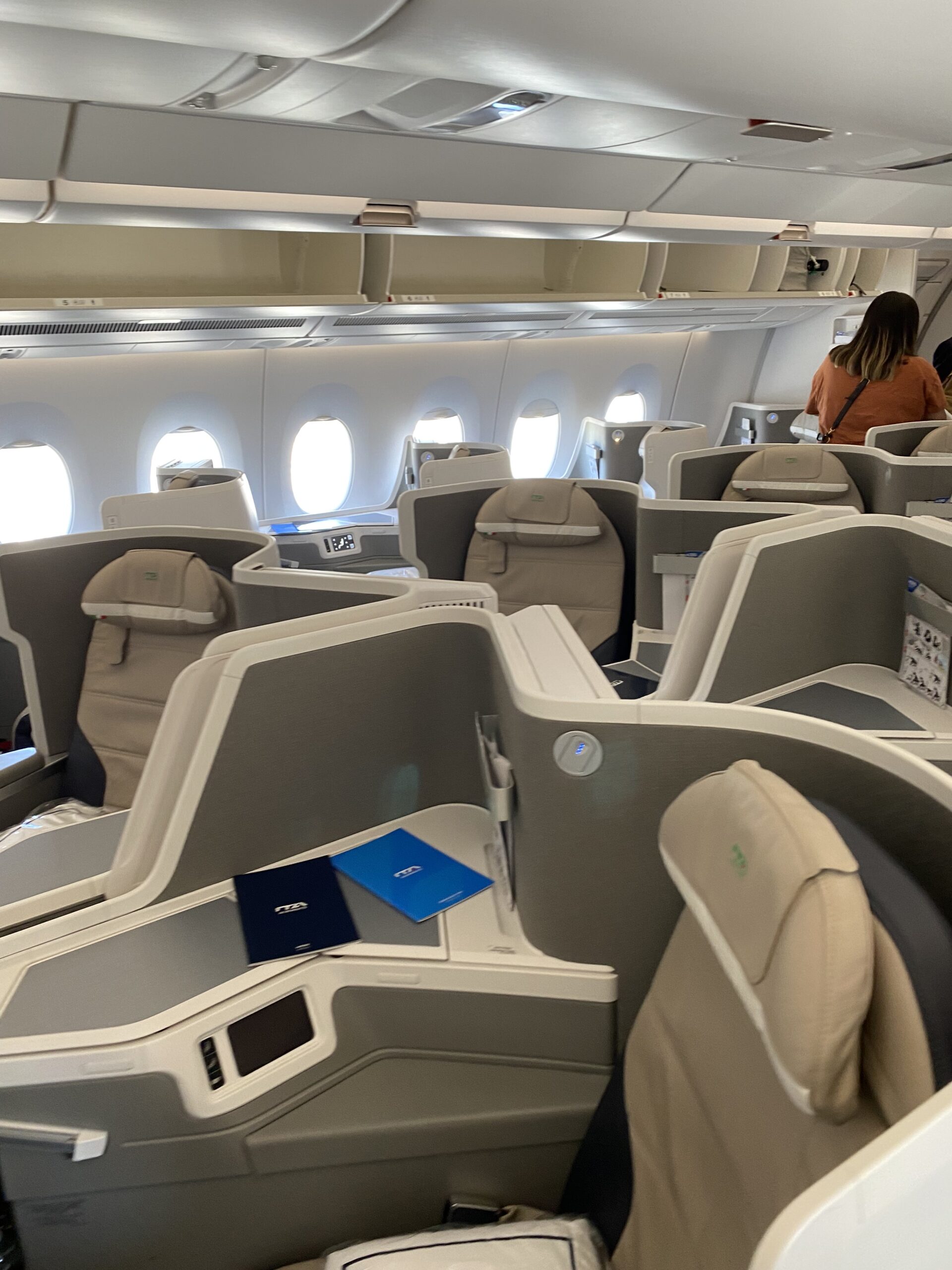 ITA Airways business class cabin interior premium seats Italian airline luxury aircraft Airbus A350 first class service]
